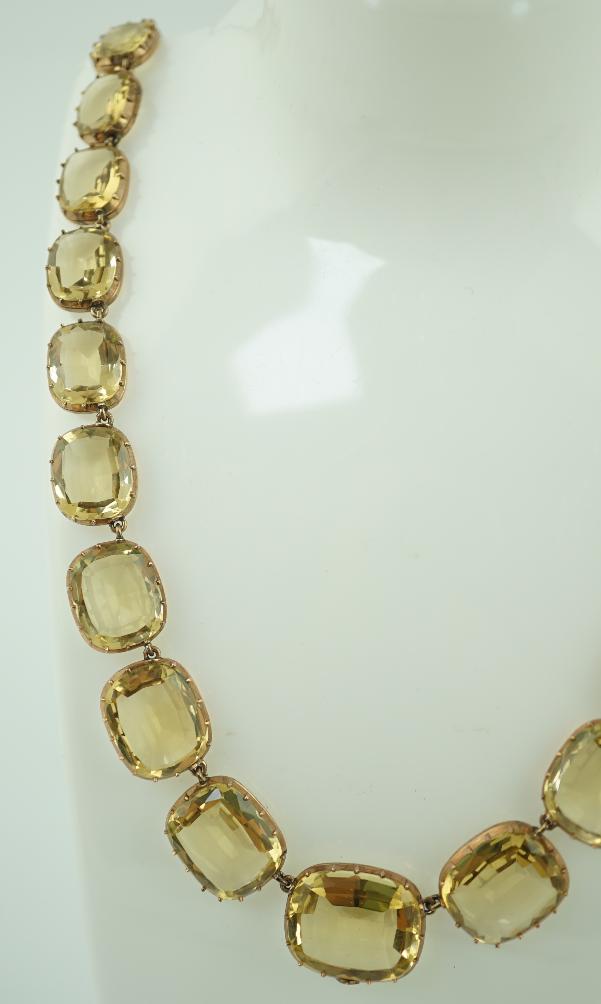 A Victorian gold and graduated cushion cut citrine necklace